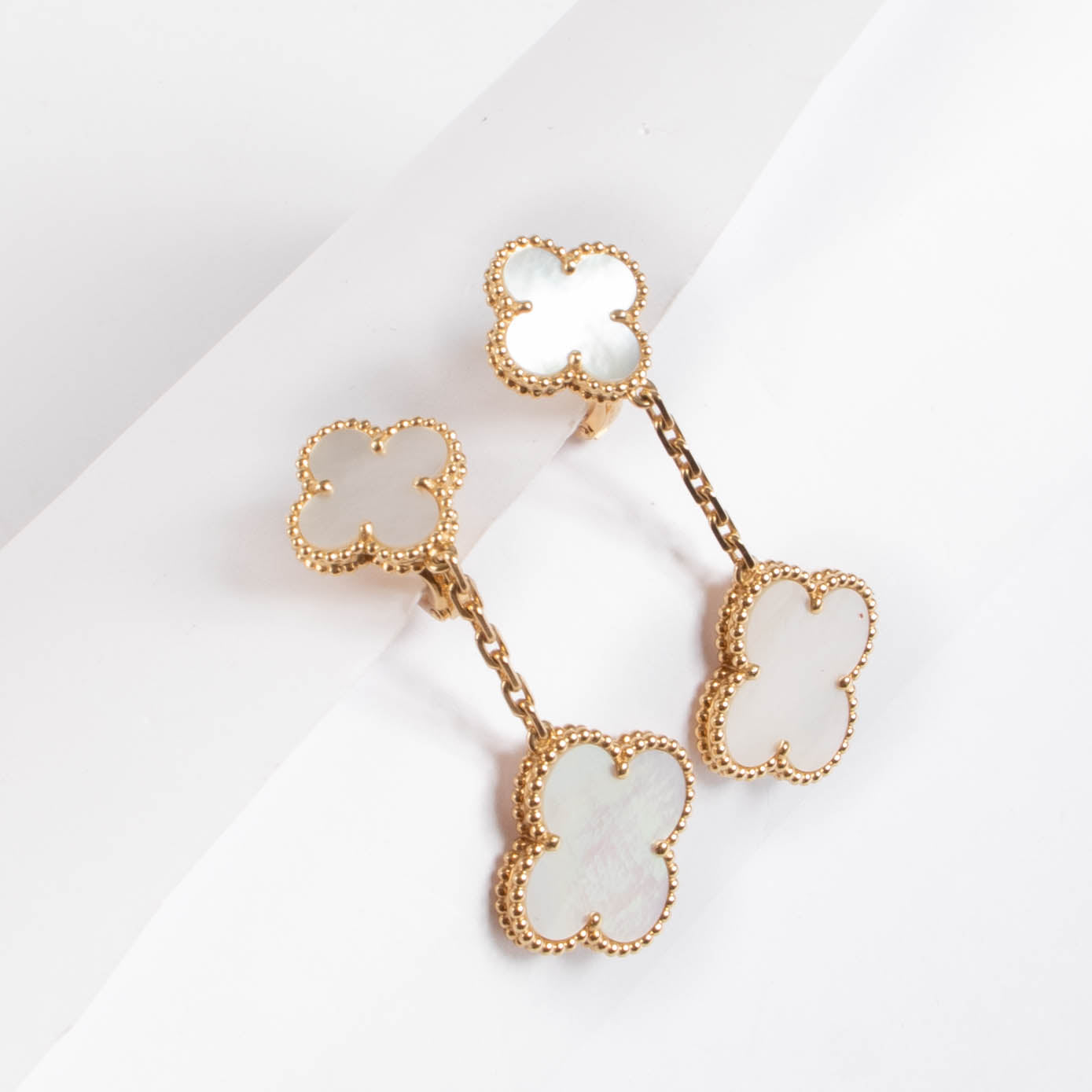 Van Cleef & Arpels Yellow Gold/Mother-of-pearl Magic Alhambra Earrings, 2 Motifs