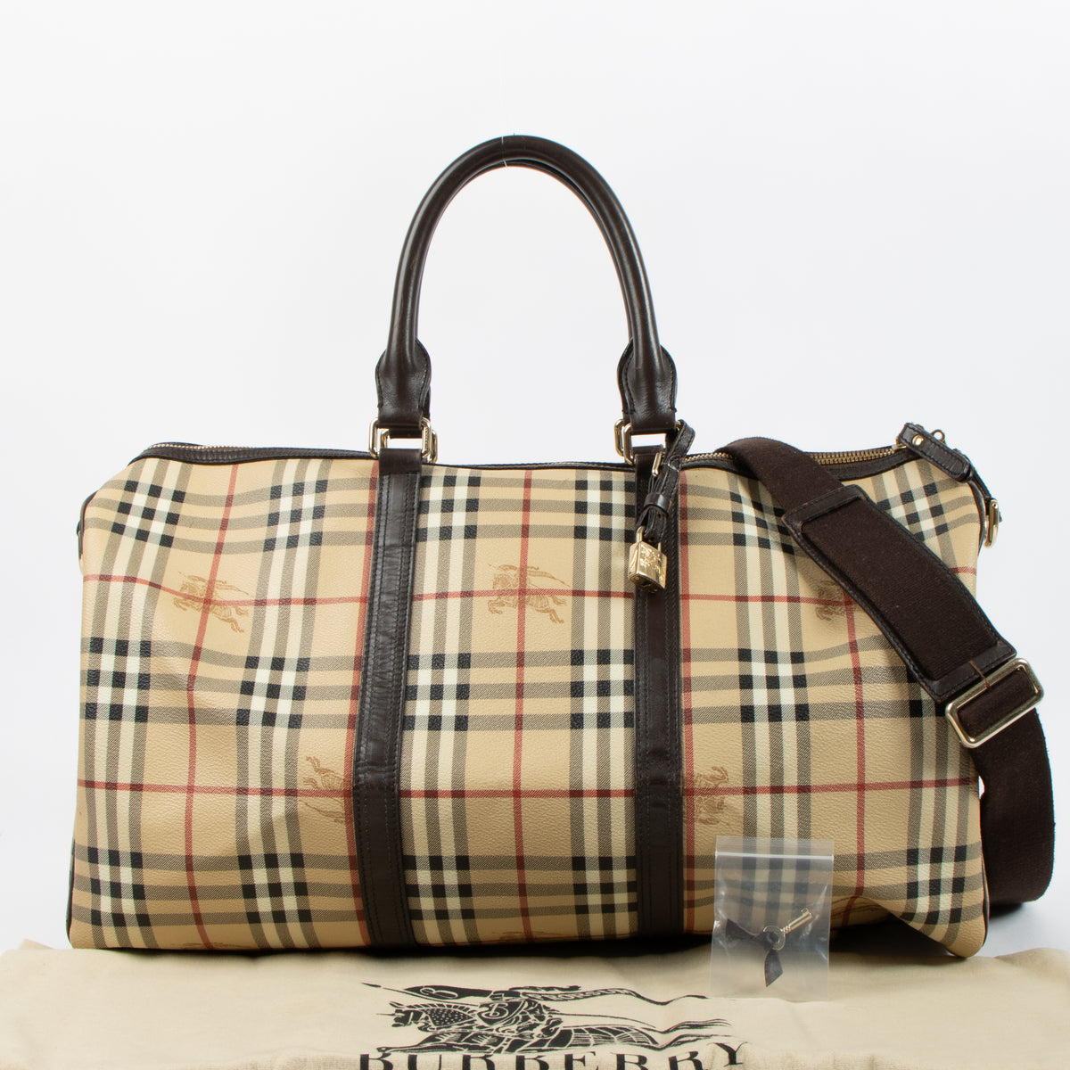 Shop the authentic Burberry Beige Haymarket Check Duffle Bag second hand on Labellov.com!