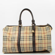 Shop the authentic Burberry Beige Haymarket Check Duffle Bag second hand on Labellov.com!