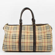 Shop the authentic Burberry Beige Haymarket Check Duffle Bag second hand on Labellov.com!