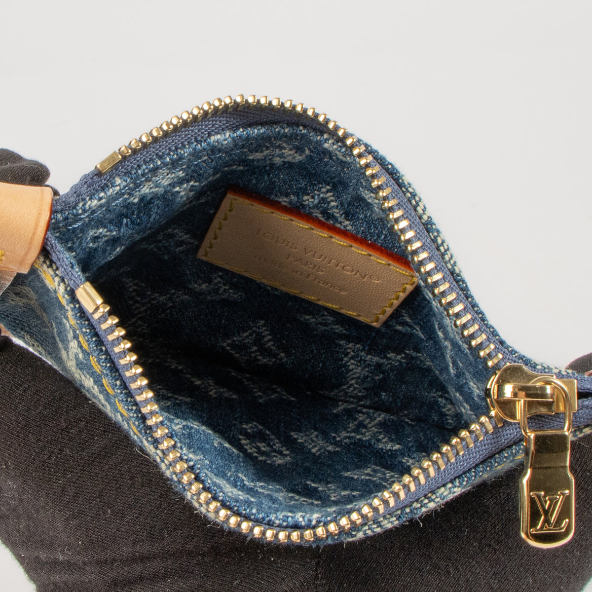 Shop this authentic Louis Vuitton Blue Denim All-In BB Pouch pre-loved on Labellov.com