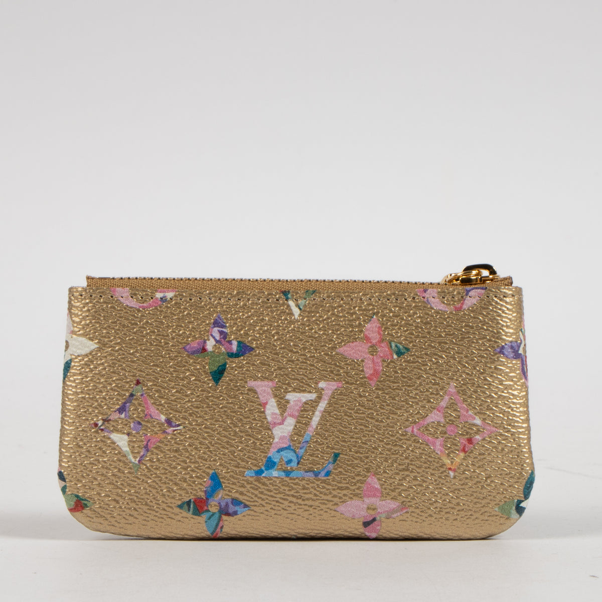 Shop this authentic Louis Vuitton Gold Monogram Garden Key Pouch pre-loved on Labellov.com