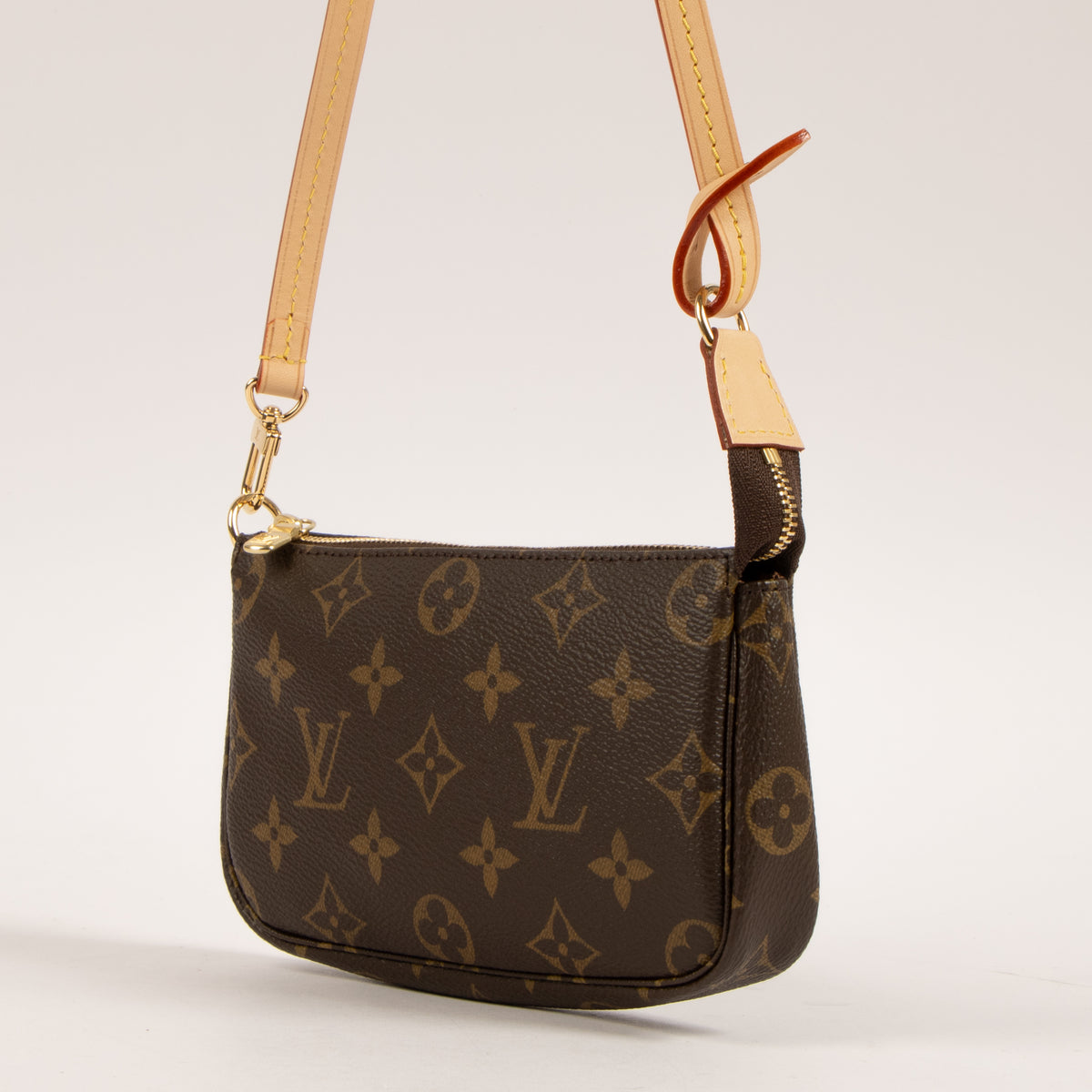 Shop this authentic Louis Vuitton Monogram Bucket Pochette with Strap Pre-Loved on Labellov.com