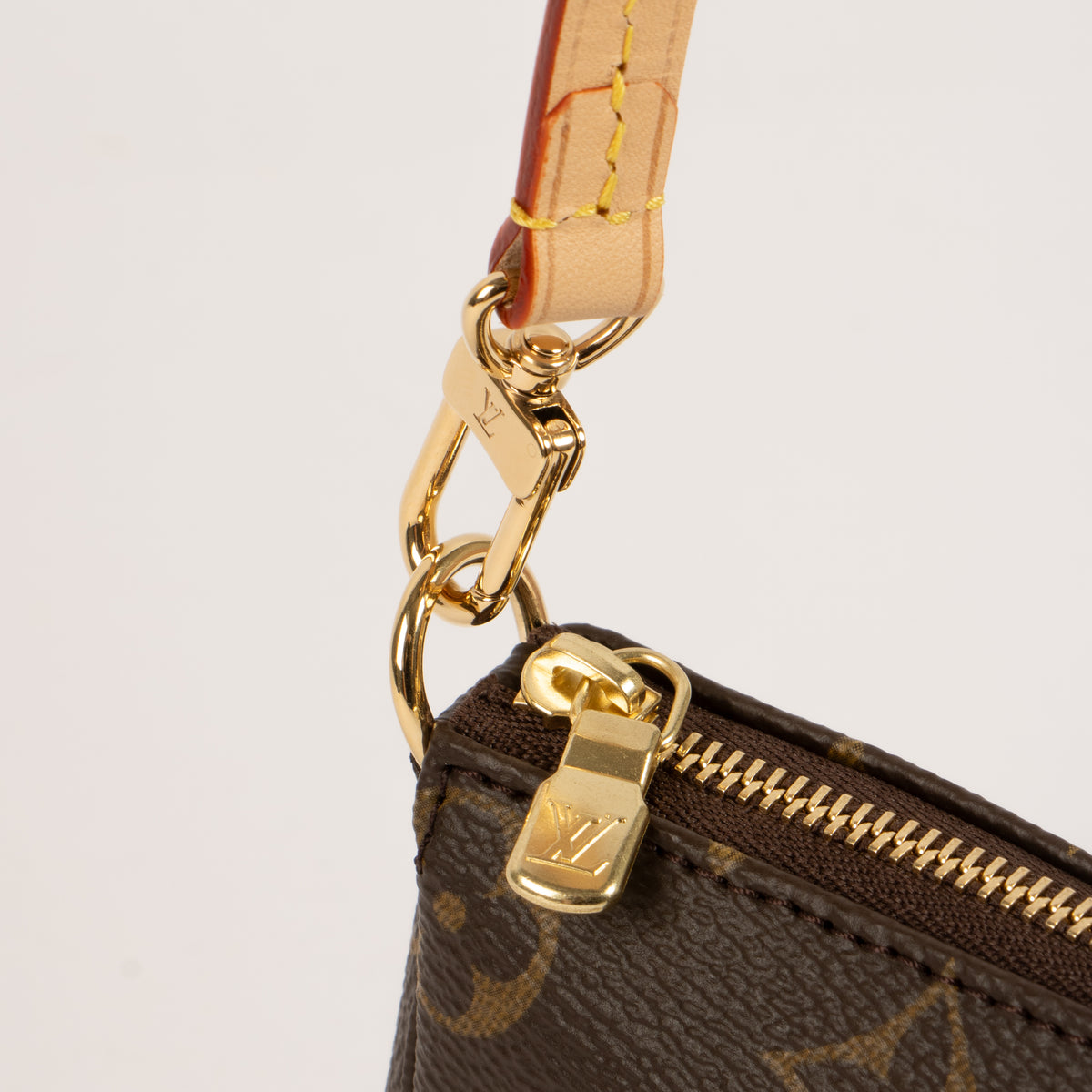 Shop this authentic Louis Vuitton Monogram Bucket Pochette with Strap Pre-Loved on Labellov.com