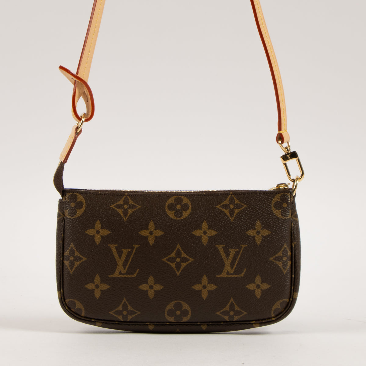 Shop this authentic Louis Vuitton Monogram Bucket Pochette with Strap Pre-Loved on Labellov.com
