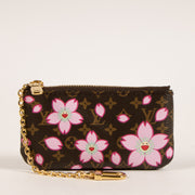 Shop this authentic Louis Vuitton Murakami Monogram Cherry Blossom Key Pouch Pre-Loved on Labellov.com