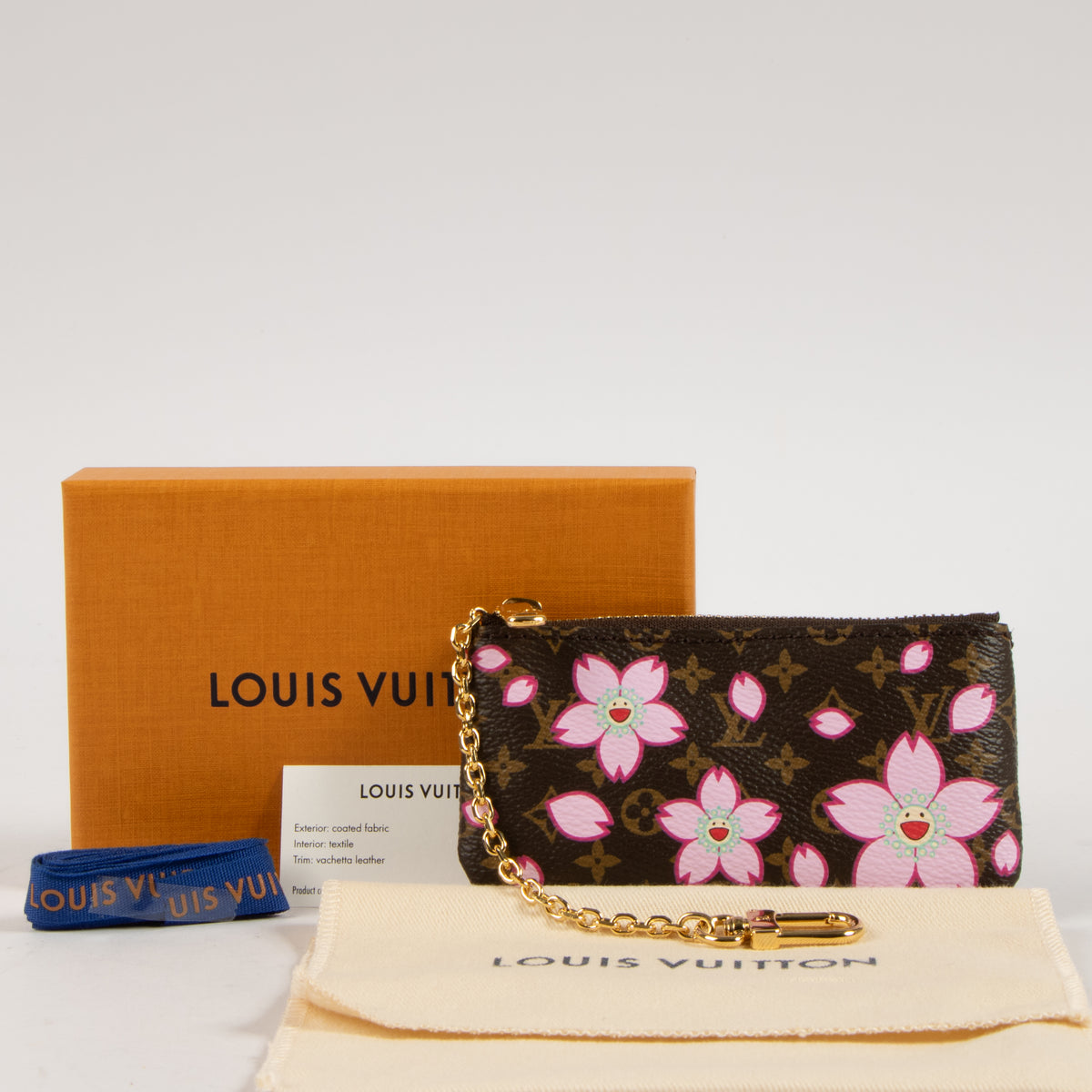 Shop this authentic Louis Vuitton Murakami Monogram Cherry Blossom Key Pouch Pre-Loved on Labellov.com