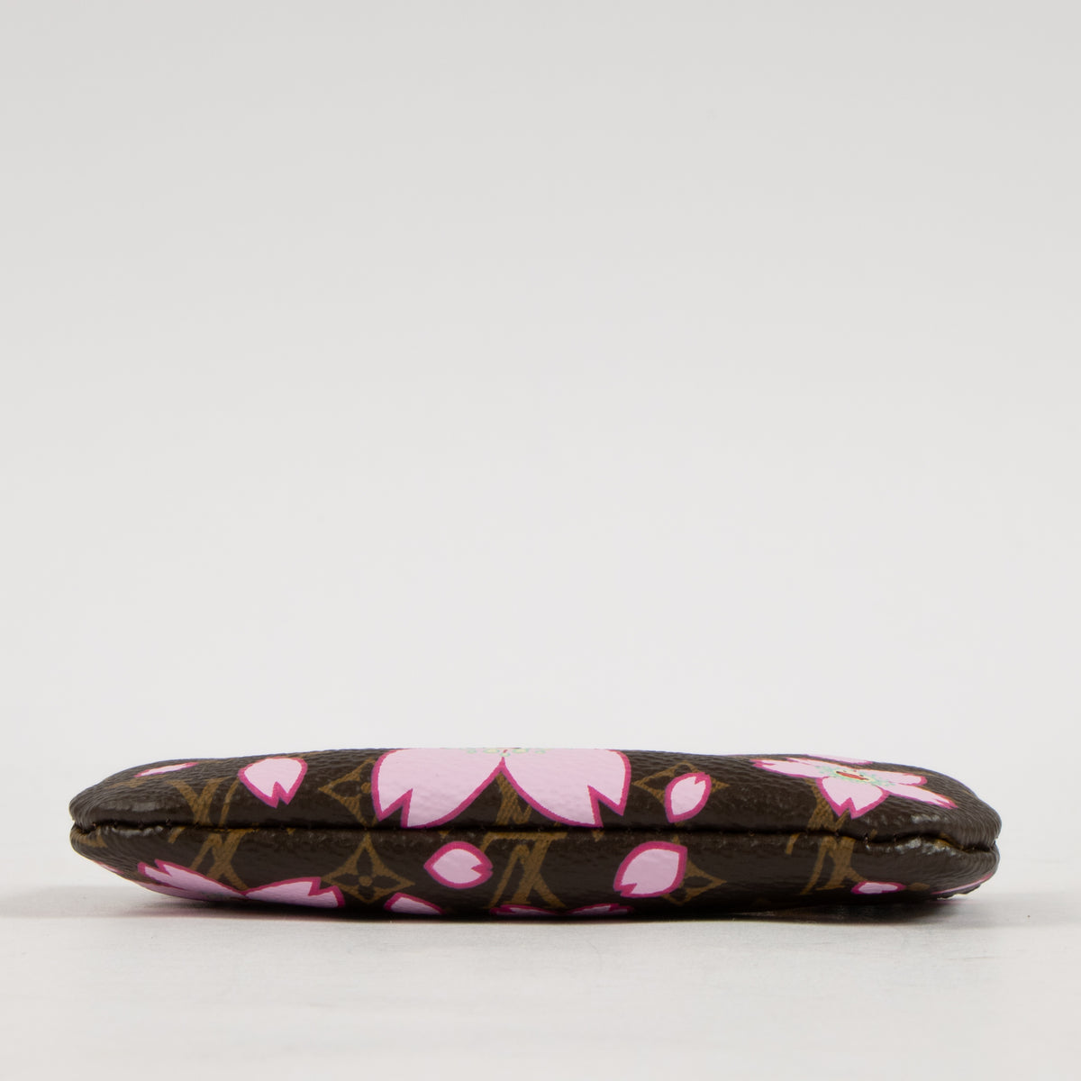 Shop this authentic Louis Vuitton Murakami Monogram Cherry Blossom Key Pouch Pre-Loved on Labellov.com