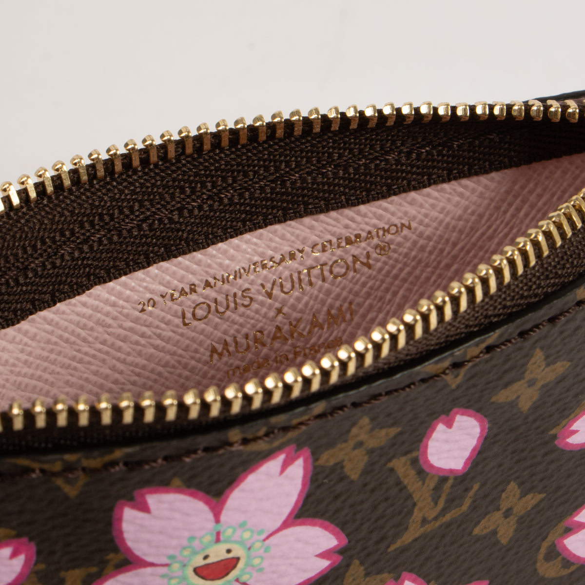 Shop this authentic Louis Vuitton Murakami Monogram Cherry Blossom Key Pouch Pre-Loved on Labellov.com