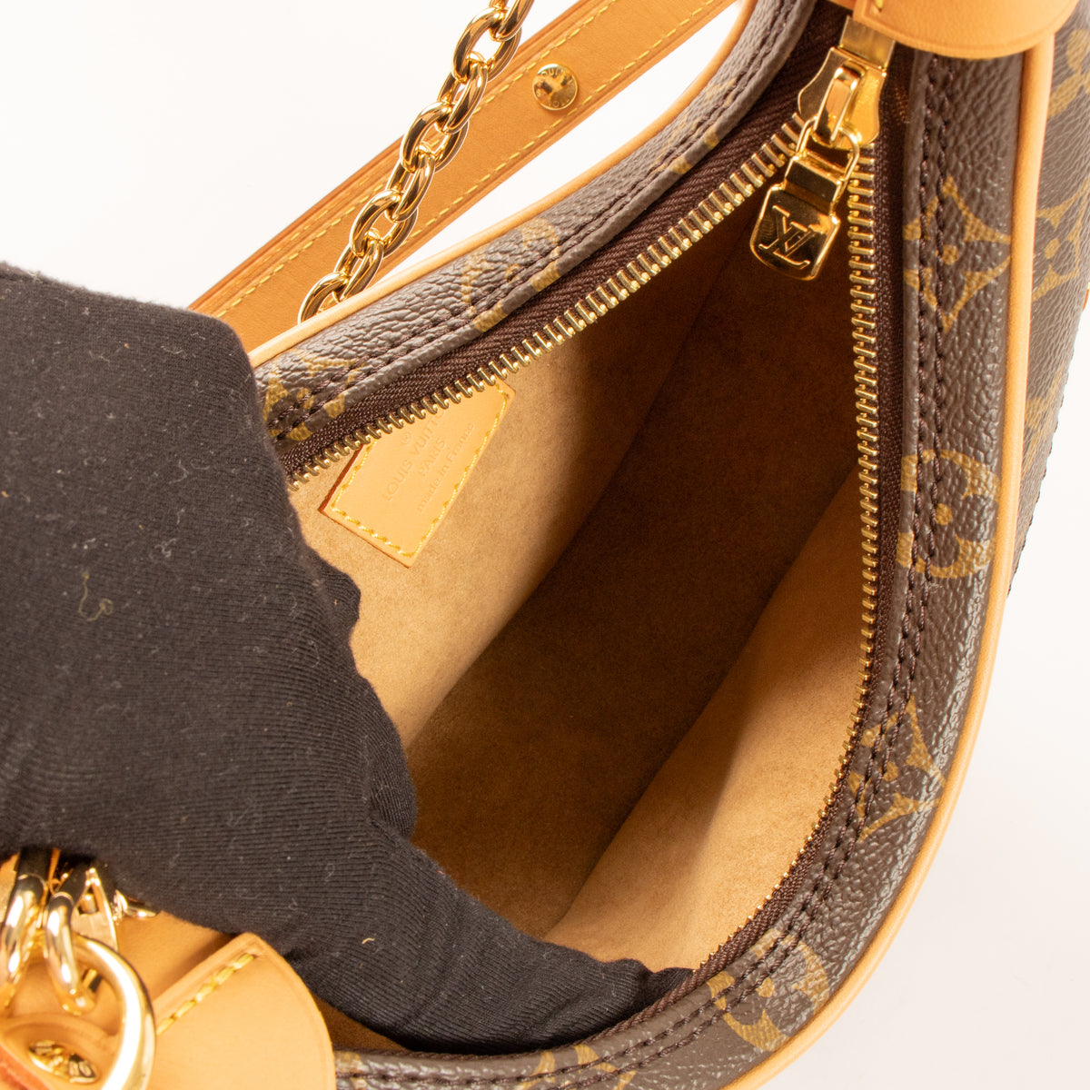 Shop this authentic Louis Vuitton Monogram Loop Shoulder Bag pre-loved on Labellov. 