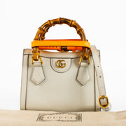 Shop this authentic Gucci Beige Leather Diana Small Tote Bag pre-loved on Labellov.com