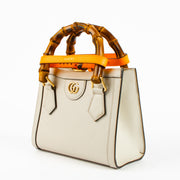 Shop this authentic Gucci Beige Leather Diana Small Tote Bag pre-loved on Labellov.com