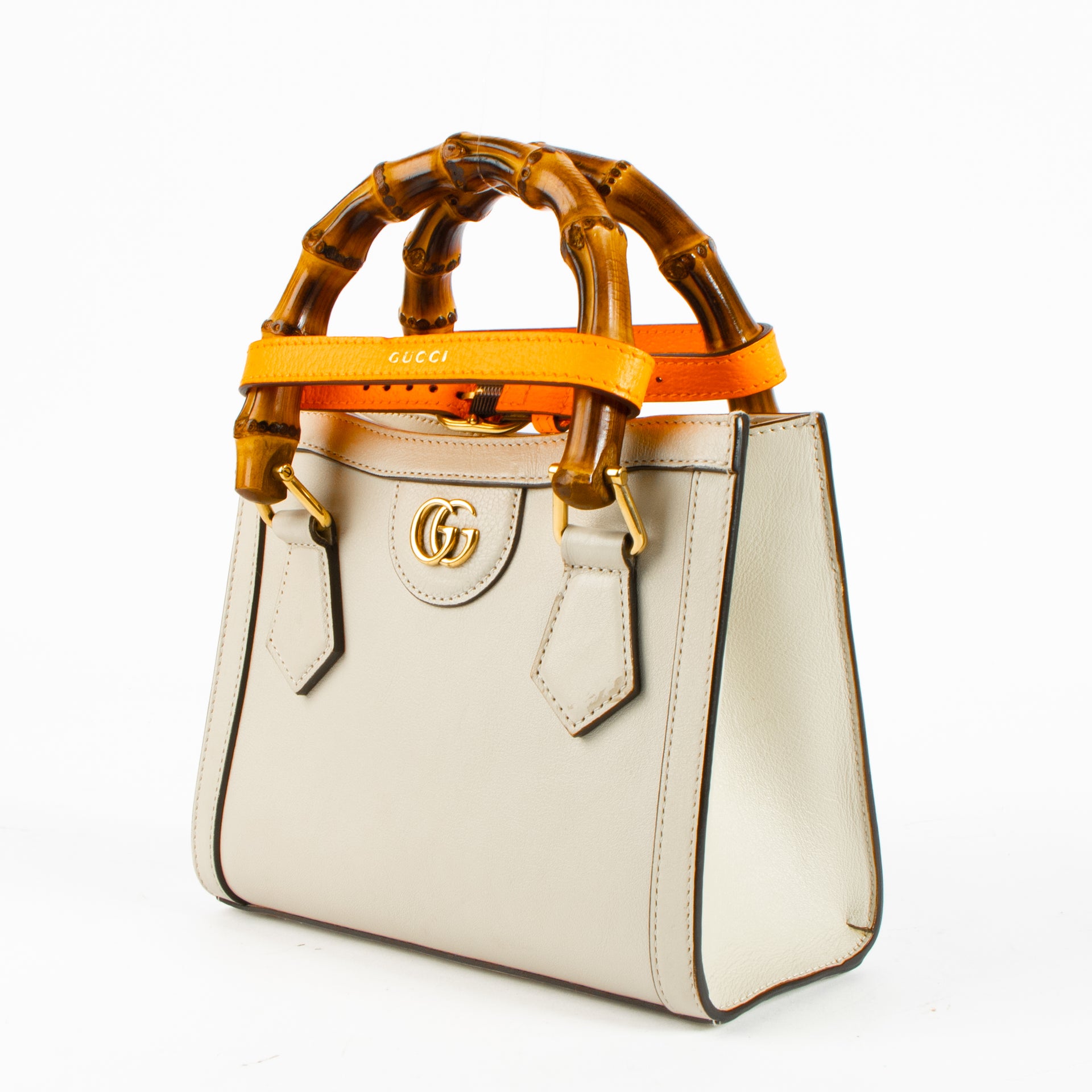 Shop this authentic Gucci Beige Leather Diana Small Tote Bag pre-loved on Labellov.com