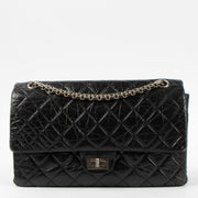 Shop this authentic Chanel Black Aged Calfskin Large Reissue 2.55 Bag pre-loved on Labellov.com