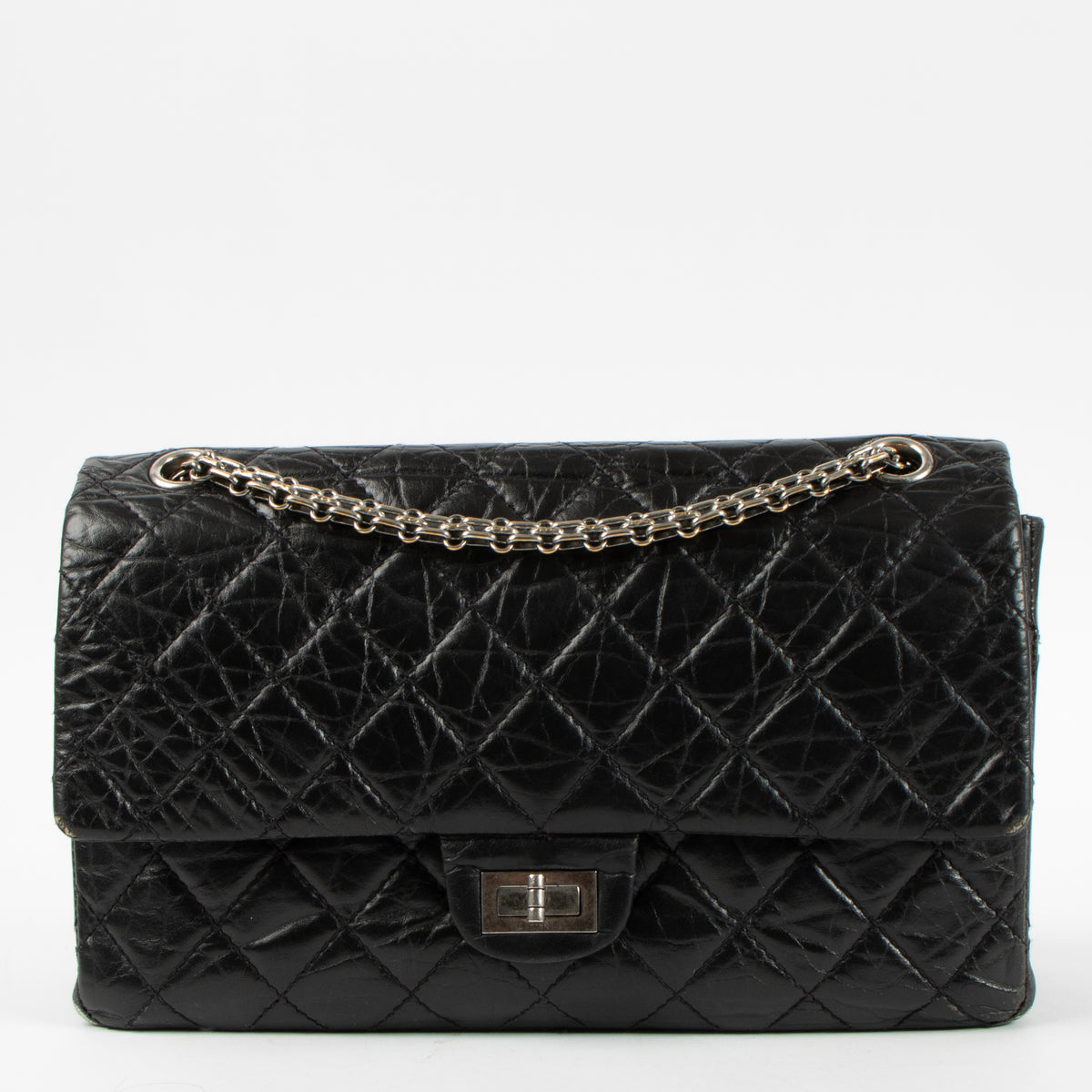Shop this authentic Chanel Black Aged Calfskin Large Reissue 2.55 Bag pre-loved on Labellov.com