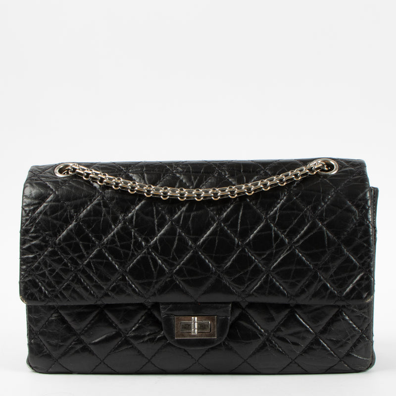 Shop this authentic Chanel Black Aged Calfskin Large Reissue 2.55 Bag pre-loved on Labellov.com