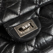 Shop this authentic Chanel Black Aged Calfskin Large Reissue 2.55 Bag pre-loved on Labellov.com