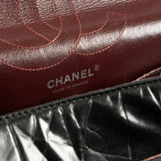 Shop this authentic Chanel Black Aged Calfskin Large Reissue 2.55 Bag pre-loved on Labellov.com
