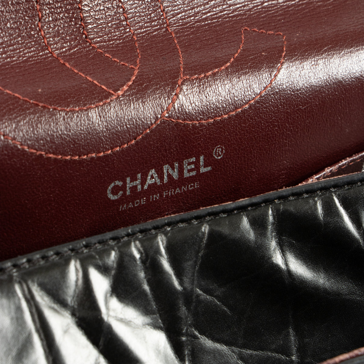 Shop this authentic Chanel Black Aged Calfskin Large Reissue 2.55 Bag pre-loved on Labellov.com