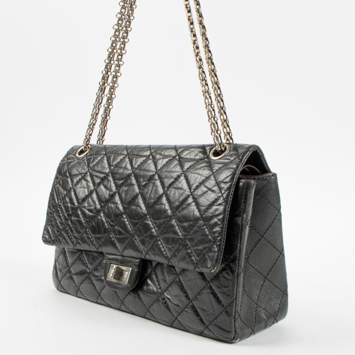 Shop this authentic Chanel Black Aged Calfskin Large Reissue 2.55 Bag pre-loved on Labellov.com