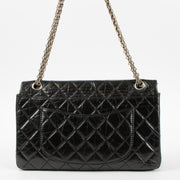 Shop this authentic Chanel Black Aged Calfskin Large Reissue 2.55 Bag pre-loved on Labellov.com