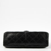Shop this authentic Chanel Black Aged Calfskin Large Reissue 2.55 Bag pre-loved on Labellov.com