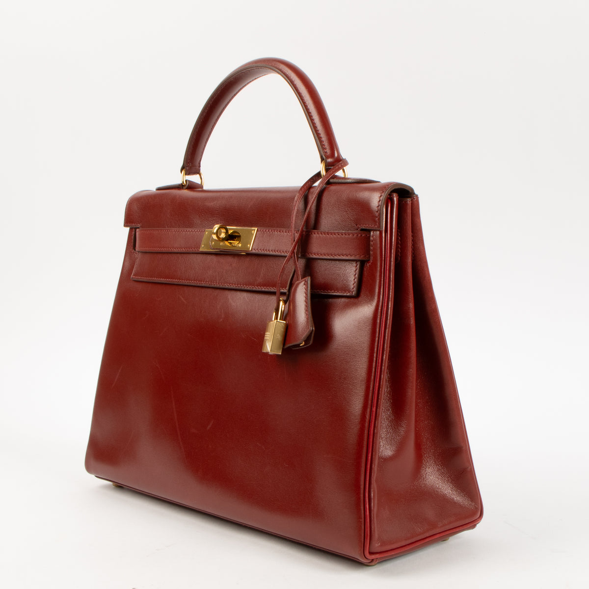 Shop the authentic Hermes Vintage Kelly 32 Rouge Vif Box GHW on Labellov.com.