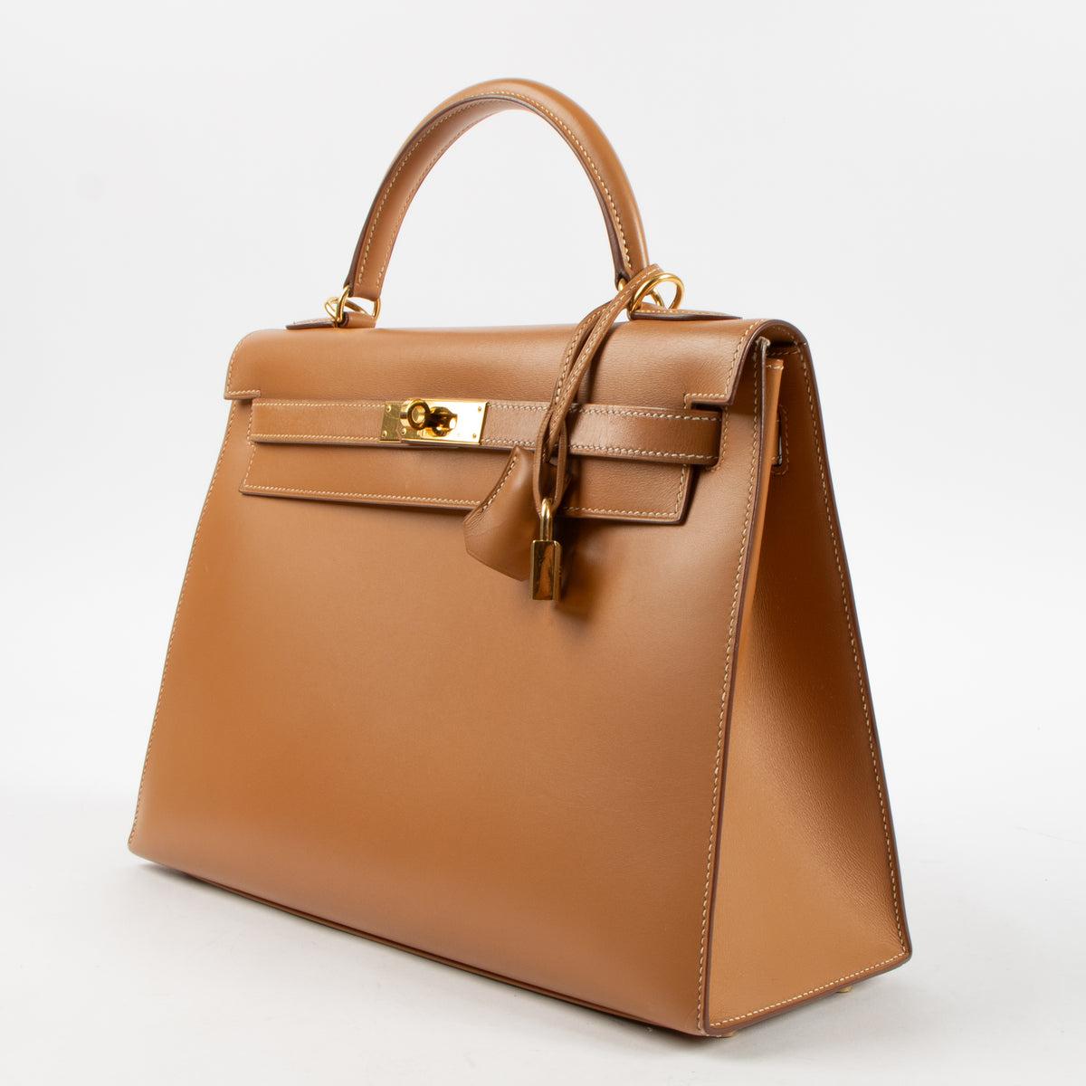 Shop the authentic Hermes Vintage Kelly 32 Naturel Sable Box GHW on Labellov.com.

