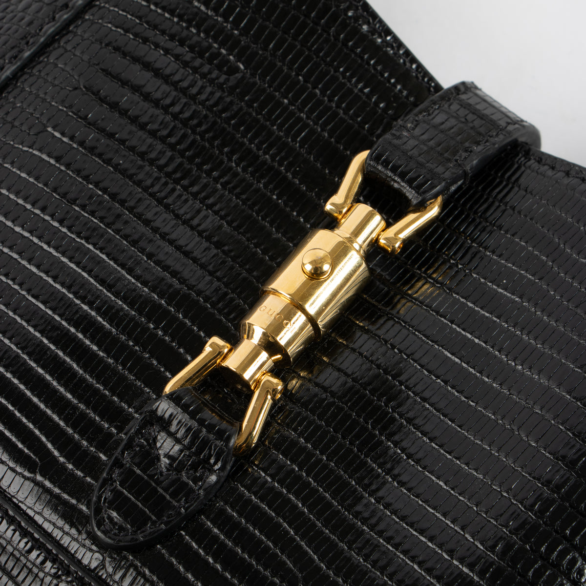 Shop this authentic Gucci Black Lizard Jackie Mini Bag pre-loved on Laballov.com