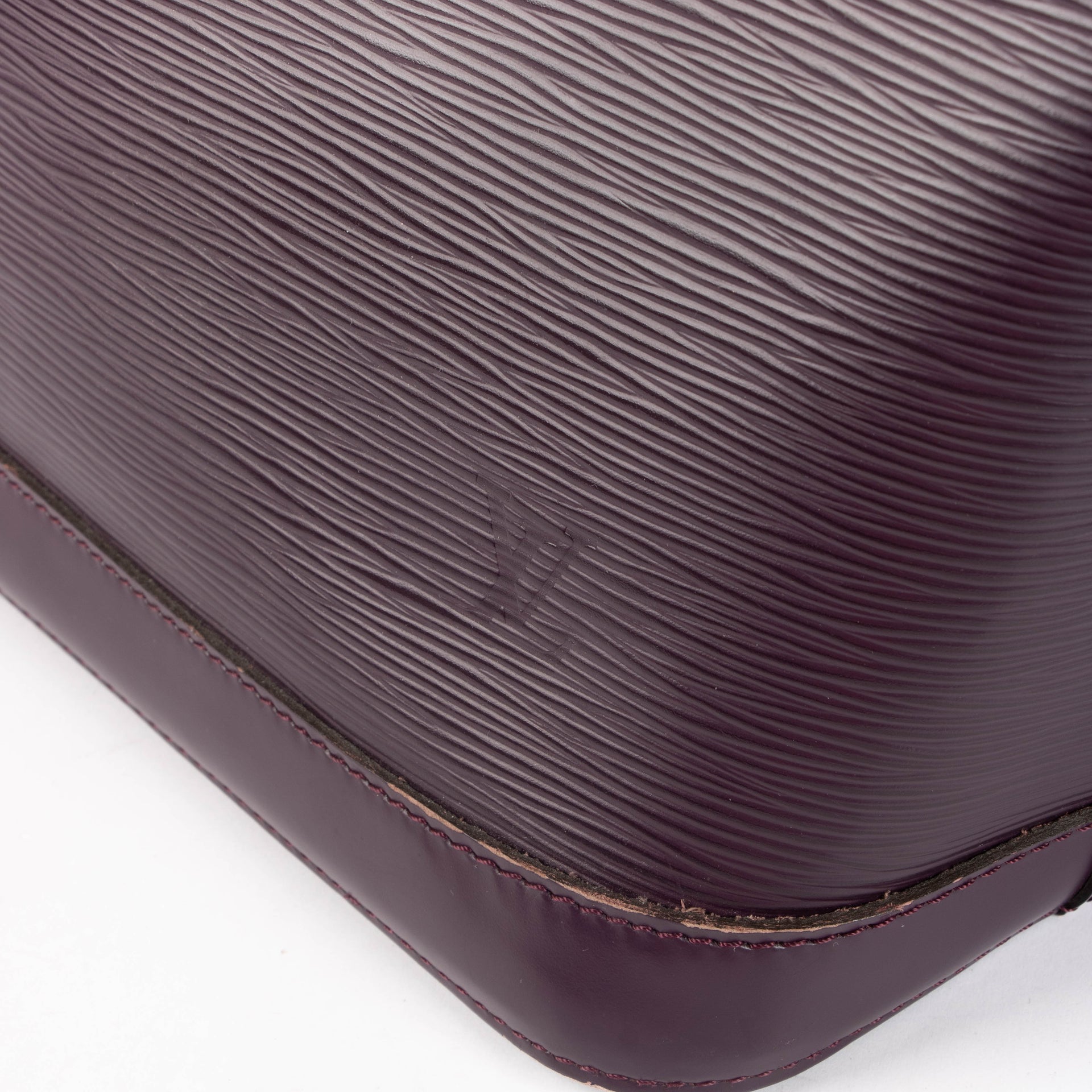 Shop this authentic Louis Vuitton Epi Prune Alma Pre-loved on Labellov.com 
