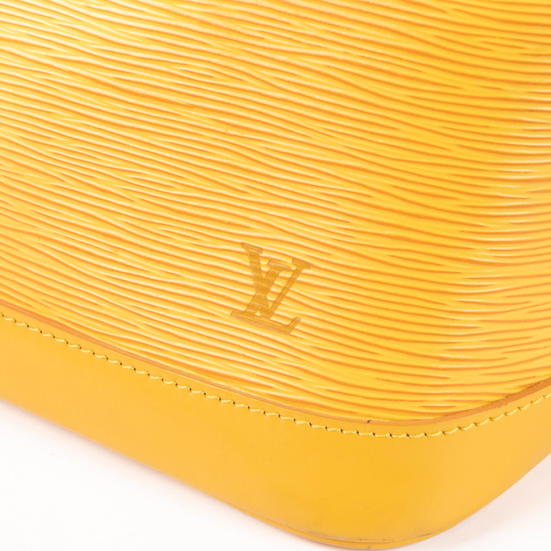 Shop this authentic Louis Vuitton Yellow Epi Alma PM pre-loved on Labellov.com 