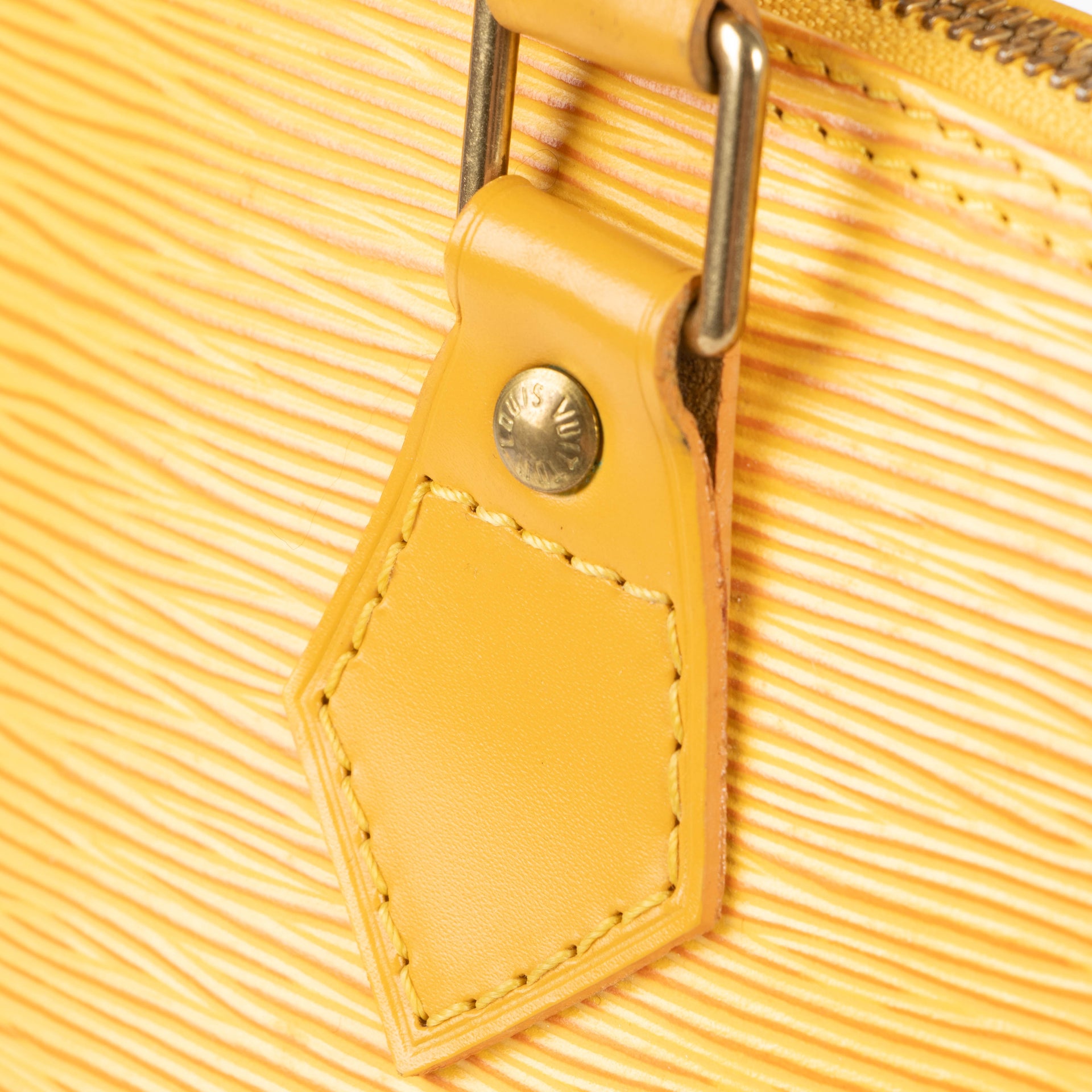 Shop this authentic Louis Vuitton Yellow Epi Alma PM pre-loved on Labellov.com 