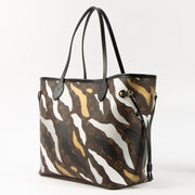 Shop this authentic Louis Vuitton x LOL Neverfull MM Bag pre-loved on Labellov.com