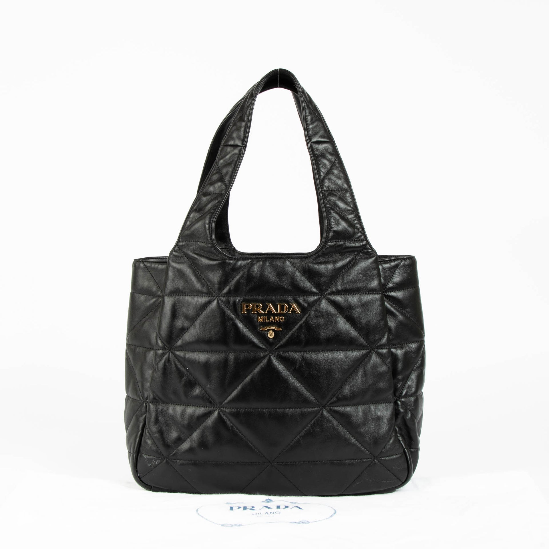 Shop this 100% authentic Prada Black Quilted Dynamique Medium Tote Bag at Labellov.com