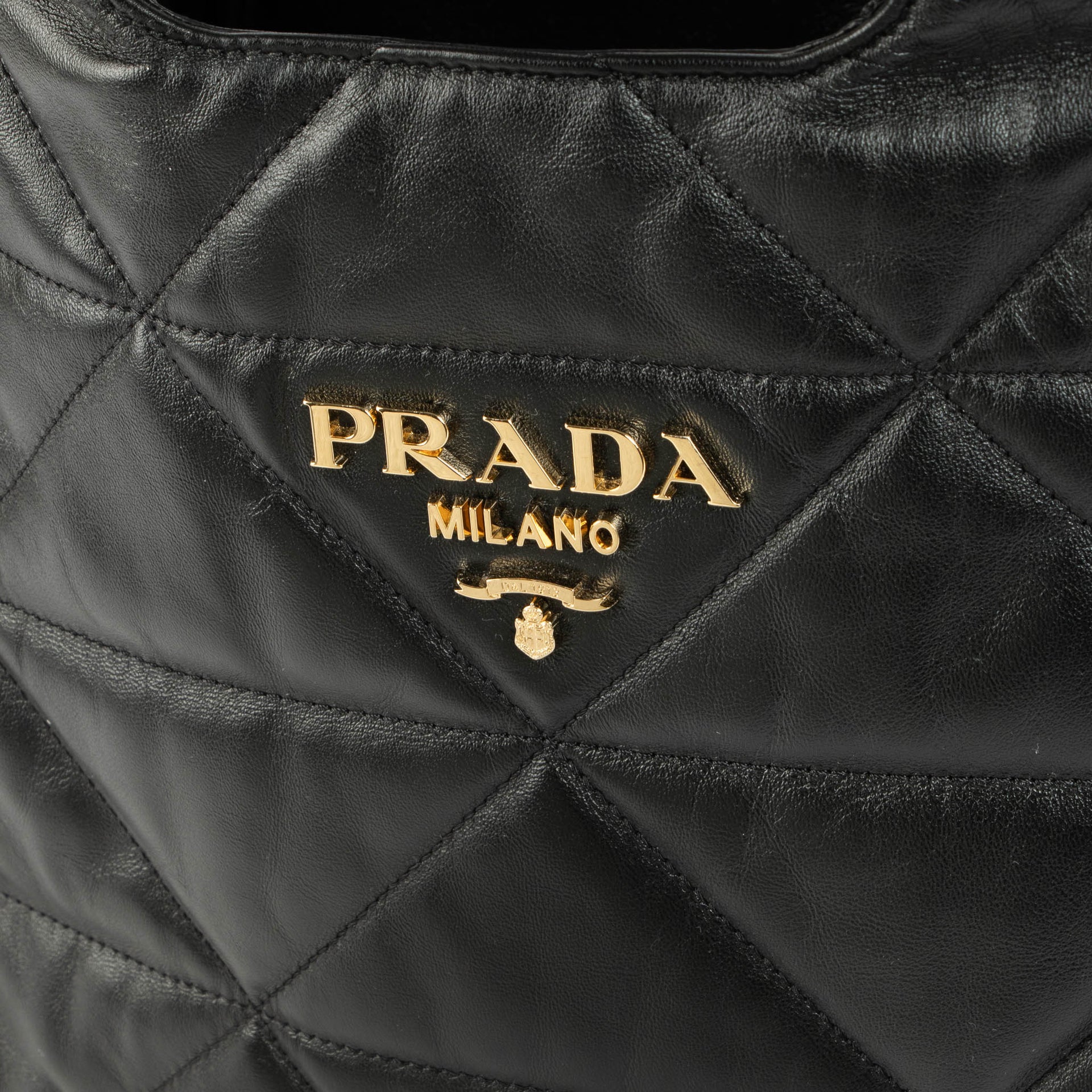 Shop this 100% authentic Prada Black Quilted Dynamique Medium Tote Bag at Labellov.com