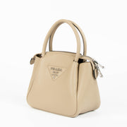Shop this 100% authentic Prada Clay Grey Small Handbag at Labellov.com