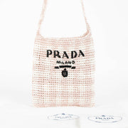 Shop this 100% authentic Prada Pink Raffia Bag at Labellov.com