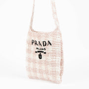 Shop this 100% authentic Prada Pink Raffia Bag at Labellov.com