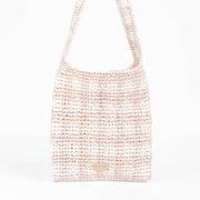Shop this 100% authentic Prada Pink Raffia Bag at Labellov.com