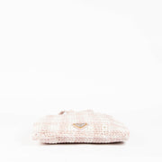 Shop this 100% authentic Prada Pink Raffia Bag at Labellov.com