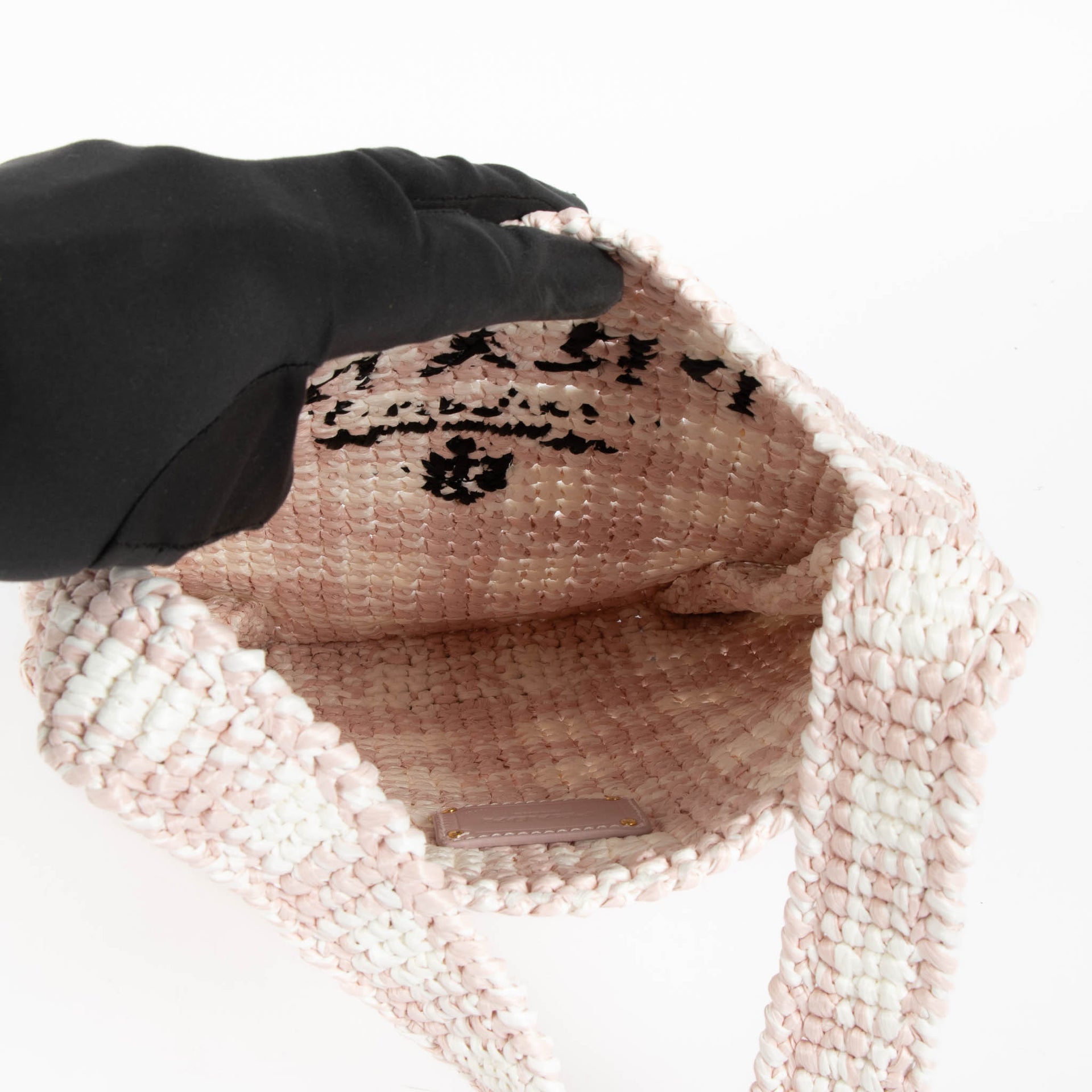 Shop this 100% authentic Prada Pink Raffia Bag at Labellov.com