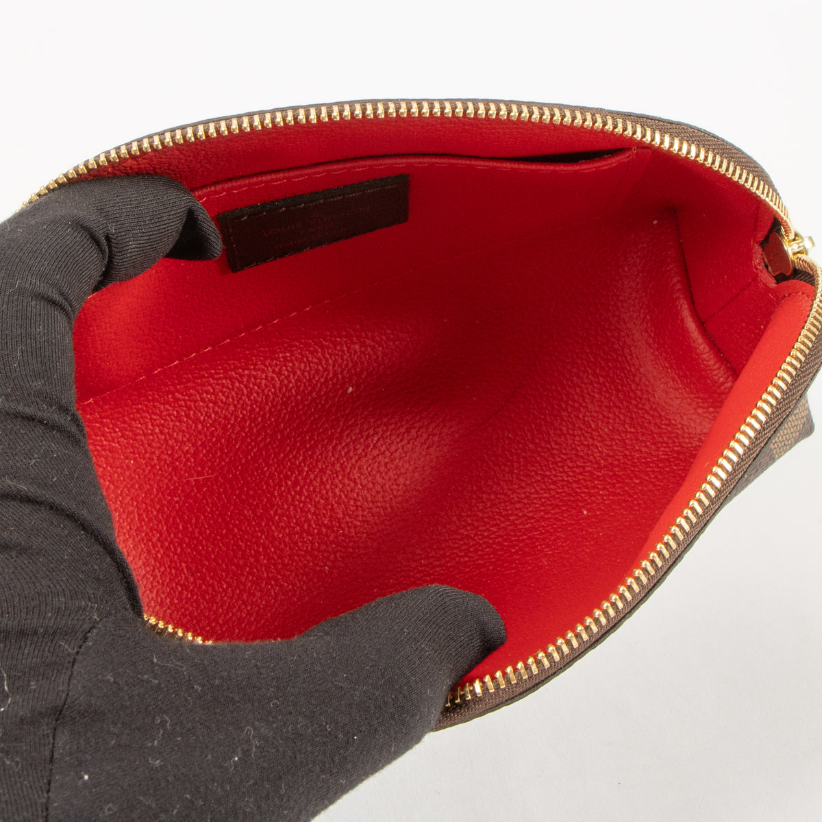 Shop this authentic Louis Vuitton Damier Ebene Canvas Cosmetic Pouch PM pre-loved on Labellov.com