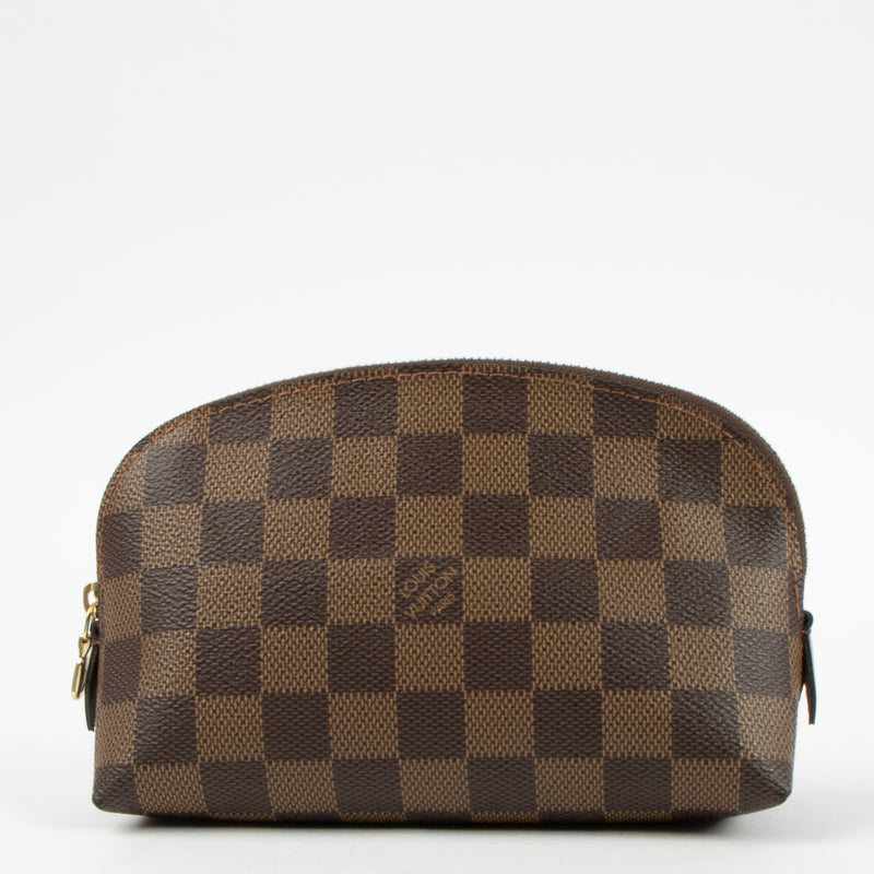 Shop this authentic Louis Vuitton Damier Ebene Canvas Cosmetic Pouch PM pre-loved on Labellov.com