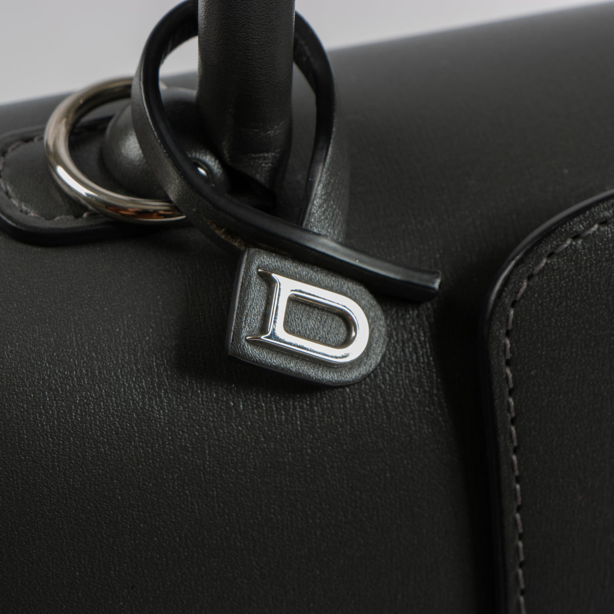 Shop this authentic Delvaux Smoke Box Calf Mirage Brillant Mini Bag pre-loved on Labellov.com 