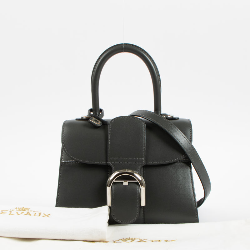 Shop this authentic Delvaux Smoke Box Calf Mirage Brillant Mini Bag pre-loved on Labellov.com 