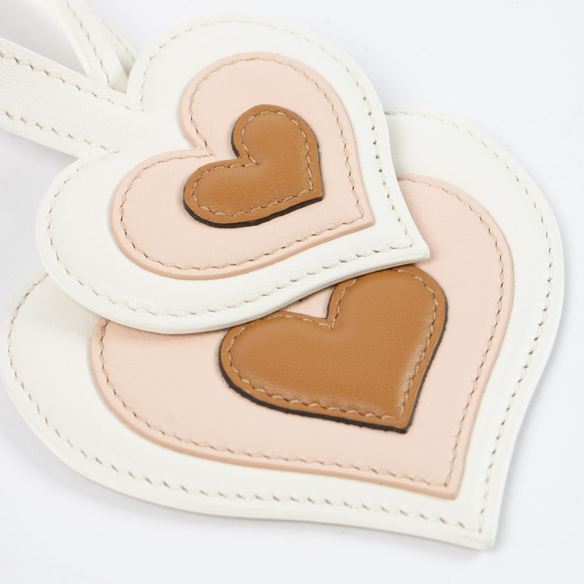 Shop this authentic Delvaux Ivory/Vegetal Calf Souple Coeur Charms pre-loved on Labellov.com