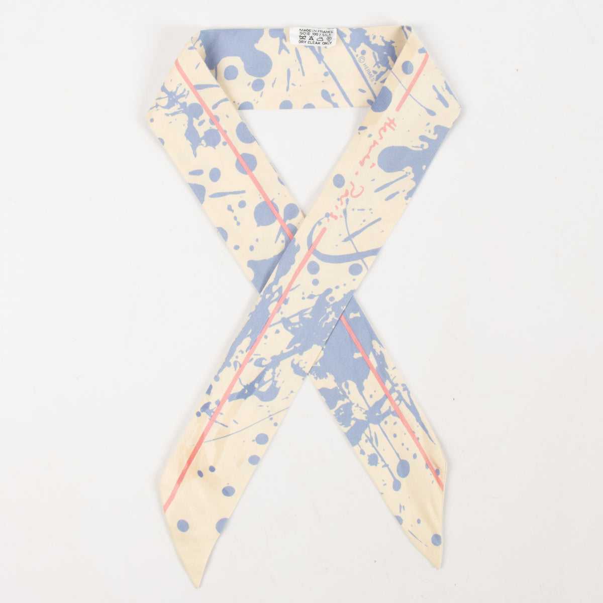 Shop this authentic Hermes Blue Paint Splatter Twilly Scarf pre-loved on Labellov.com
