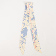 Shop this authentic Hermes Blue Paint Splatter Twilly Scarf pre-loved on Labellov.com