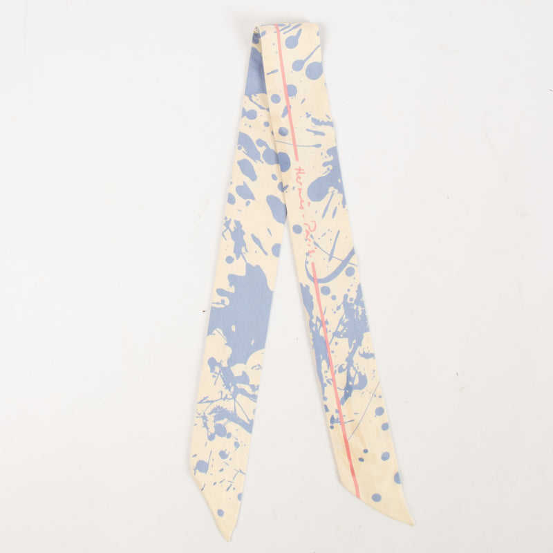 Shop this authentic Hermes Blue Paint Splatter Twilly Scarf pre-loved on Labellov.com