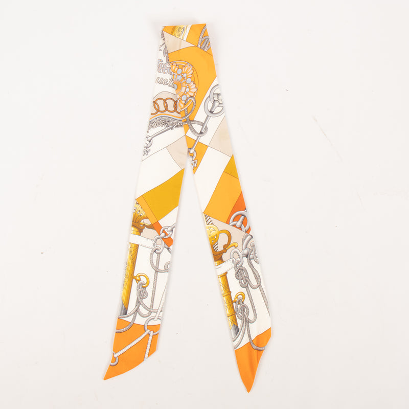 Hermes Orange Cliquetis Twilly Scarf